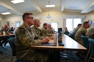 U.S. Air Force leaders sit during the opening speech to kick off CLACON at the Weckerling Building, Presidio of Monterey, California, May 15, 2024. CLACON, Cryptologic Language Analyst Convention, formerly called Visit-A-Palooza, was an opportunity for operational units and their commanders to come and see how the 517th Training Group operates. (U.S. Air Force photo by Airman 1st Class Madison Collier)