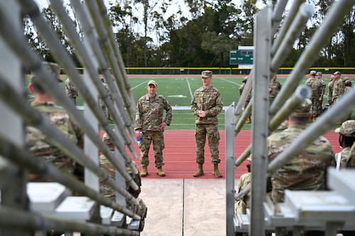 U.S. Air Force Captain Hunter Werner and Master Sgt. Braden Edwards, assigned to the 18th Intelligence Squadron, speak to technical training students during CLACON, Presidio of Monterey, California, May 15, 2024. CLACON attendees introduced themselves and their units before separating into small groups for students to ask about their future careers. (U.S. Air Force photo by Airman 1st Class Madison Collier)