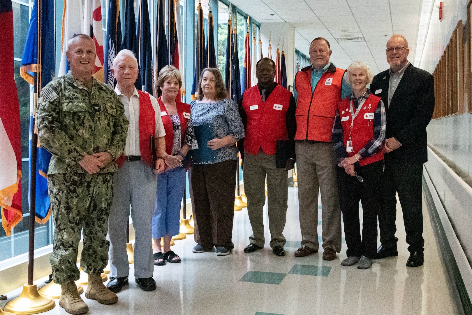 The service of American Red Cross Volunteers serving aboard Naval Health Clinic Cherry Point was celebrated at a ceremony Monday, May 13 aboard Marine Corps Air Station Cherry Point.  Mr. Al Younger, second from left, received the Presidential Volunteer Service Award during the ceremony for his 4,000 hours of volunteer service conducted over 30 years with the American Red Cross.