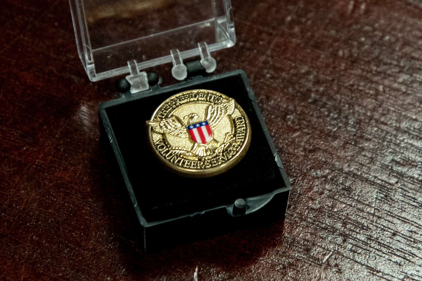 The Presidential Volunteer Service Award pin awarded to Mr. Al Younger, and American Red Cross Volunteer, during a ceremony conducted Monday, May 13 aboard Marine Corps Air Station Cherry Point.  Younger received the Presidential Volunteer Service Award during the ceremony for his 4,000 hours of volunteer service conducted over 30 years with the American Red Cross.