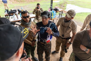 Judges discuss the results of a round of a sniper exercise during Fuerzas Comando 24 (FC24) in Cerro Tigre, Panama, May 17, 2024.