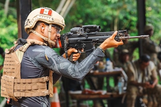 Peruvian Team competitor locks in on his target during the combined ranges of Fuerzas Comando 24 (FC24) Skills and Shooting Tests in Cerro Tigre, Panama, May 16, 2024.
