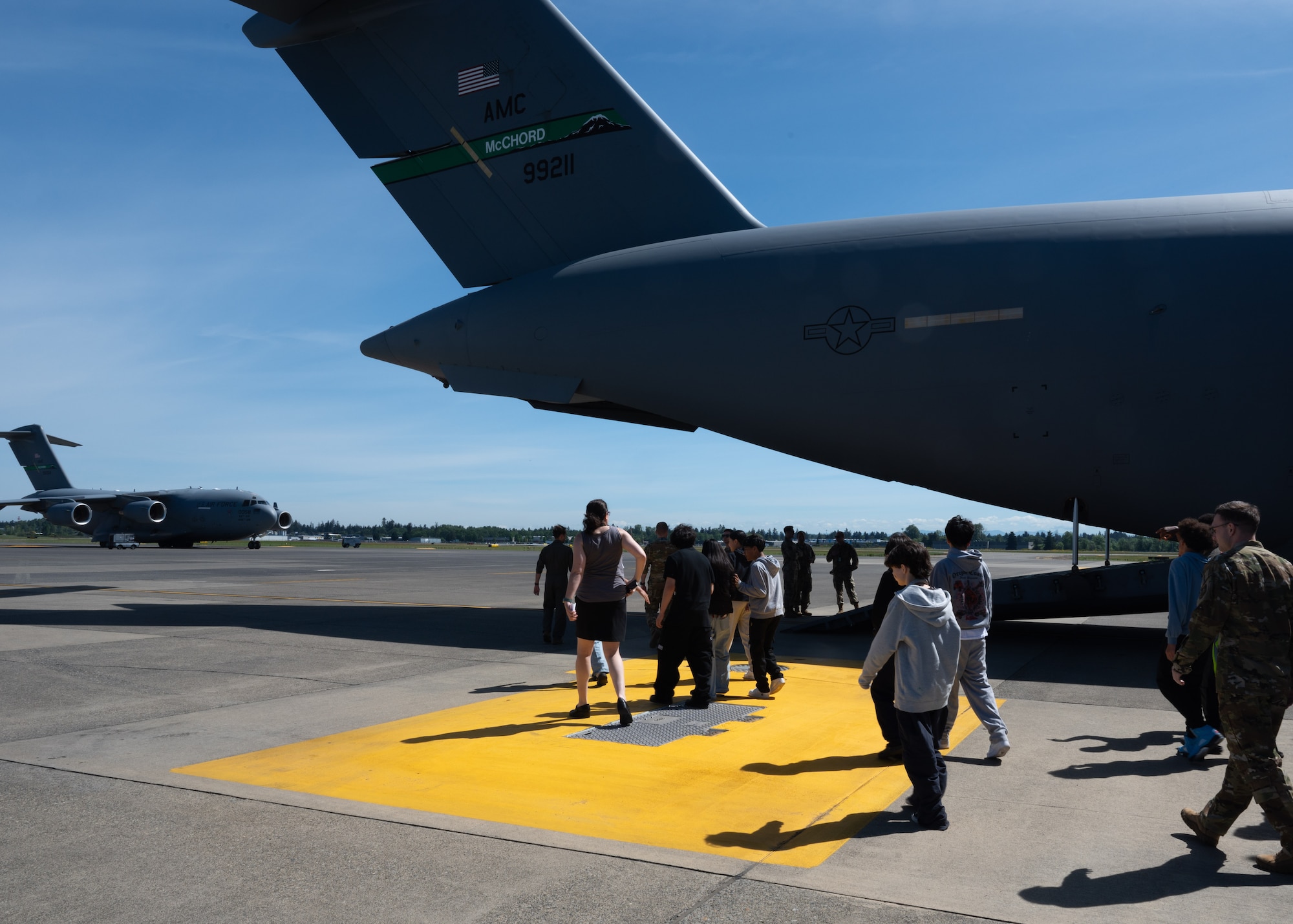 Spanaway Middle School students toured a C-17 Globemaster III and various locations around Joint Base Lewis-McChord, Washington, May 14, 2024. The students met with 62d Airlift Wing Airmen and were introduced to various aviation career fields to experience the rapid global mobility mission first-hand.