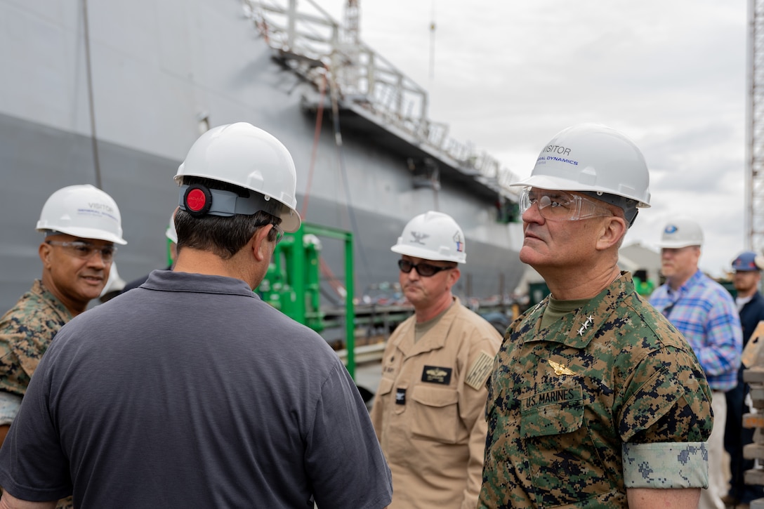 U.S. Marine Corps Lt. Gen. Karsten S. Heckl, commanding general of Combat Development Command and Deputy Commandant of Combat Development and Integration, observes the San Antonio-class amphibious transport dock, USS Arlington (LPD 24), located in a Norfolk, Va., shipyard to undergo maintenance and modernization upgrades, May 14, 2024. Heckl, among other Marine Corps and U.S. Navy service members toured the ship to better understand its current modernization undertaking. Heckl's visit to the shipyard was to gain more understanding about how the Marine Corps can better assist the Navy and industry leaders modernizing amphibious ships. (U.S. Marine Corps photo by Lance Cpl. Michael T. Bartman)