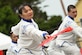 Students assigned to the 517th Training Group perform a Chinese Tachi Sword and Fan Dance during Language Day at the Defense Language Institute Foreign Language Center, Presidio of Monterey, California, May 17, 2024. Language Day emphasizes that language development is more than just mastering vocabulary and grammar; it is a key to understanding and connecting with diverse cultures around the world. (U.S. Air Force photo by Airman 1st Class Madison Collier)