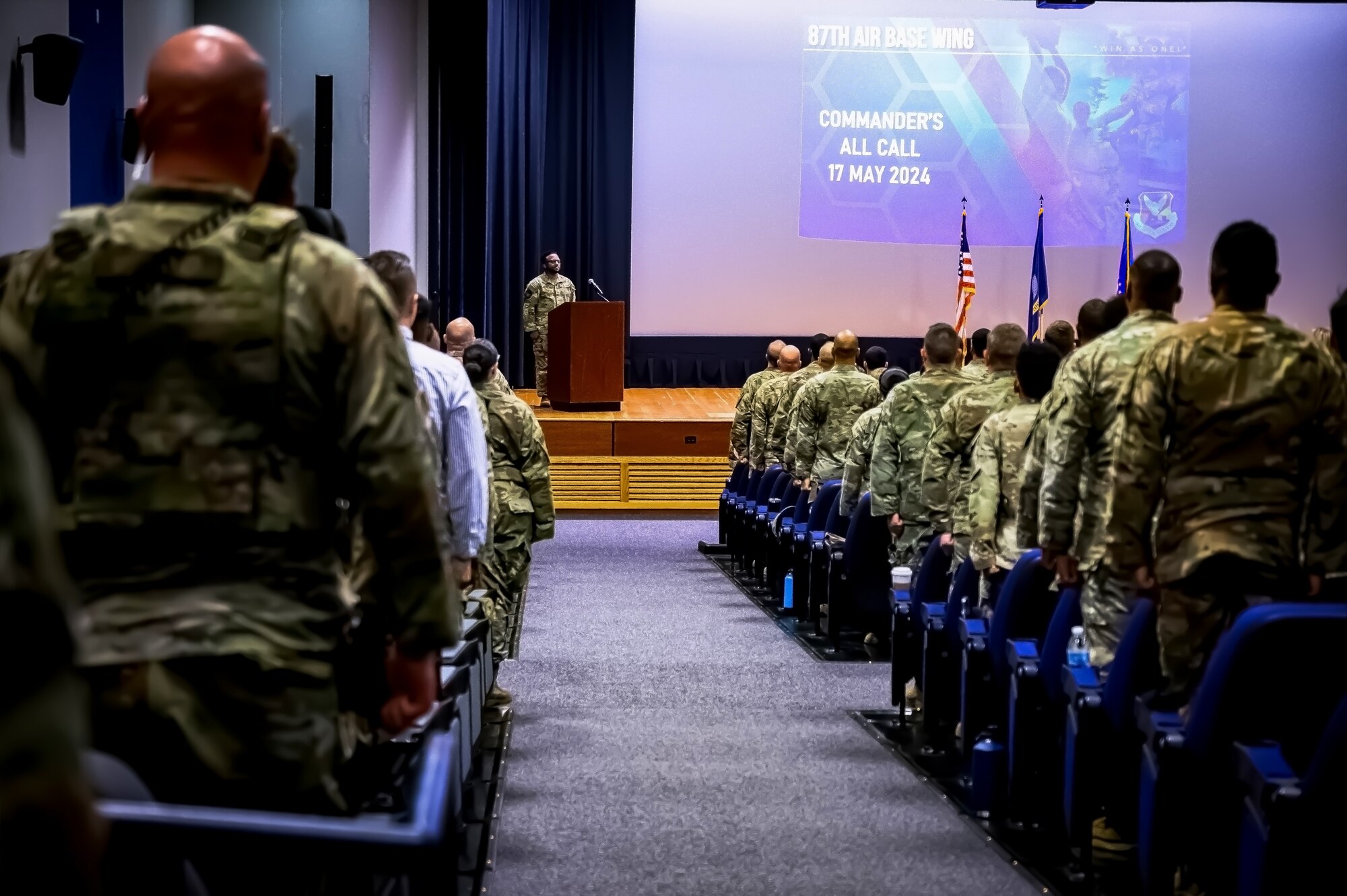 Personnel assigned to the 87th Air Base Wing attend an All Call at Joint Base McGuire-Dix-Lakehurst, N.J. on April 10, 2024. During the All Call, Joint Base personnel were initiated into the Warrior Connect program, briefed on a new virtual volunteer system, and shared a moment of silence for Senior Airman Roger Fortson.
