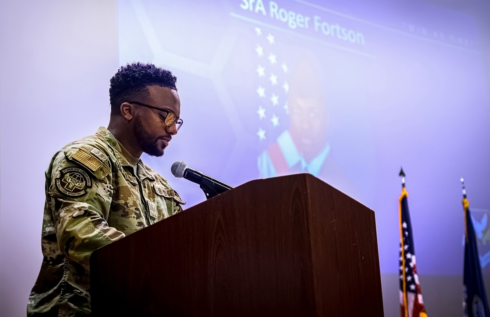 An Airman assigned to the 87th Air Base Wing provides opening remarks during an All Call at Joint Base McGuire-Dix-Lakehurst, N.J. on April 10, 2024. During the All Call, Joint Base personnel were initiated into the Warrior Connect program, briefed on a new virtual volunteer system, and shared a moment of silence for Senior Airman Roger Fortson.