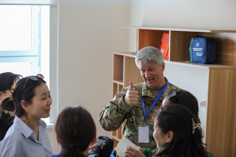 Alaska Air Guard Col. Roger Ludwig congratulates Exercise Gobi Wolf 24 participant on showcasing their exceptional medical triage skills during the GW24 Medical Challenge as part of the Field Training Exercise’s medical segment in Choibalsan, Mongolia, May 10.