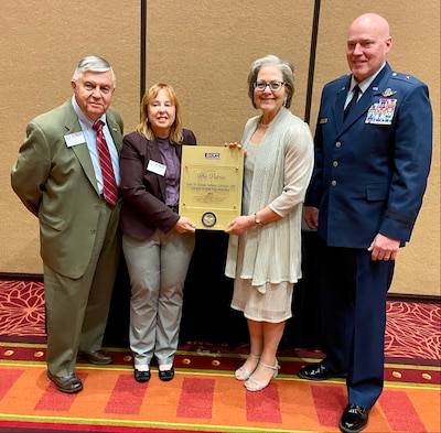 ESGR State Chair Laurie Silvey presents Jennifer Brumbick of East St. Louis School District 189 - James Avant Elementary School (#eaststlouis) with the Pro Patria Award, one of the highest level Illinois ESGR awards.