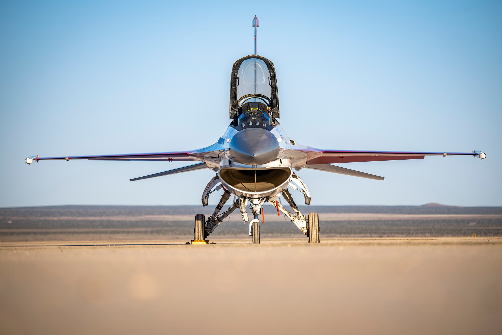 The 412th Maintenance Group, Fabrication Flight - Corrosion Control Team recently repainted the F-16 Viper Demo Team aircraft in the classic YF-16 livery to commemorate the platform's first flight 50 years ago at Edwards Air Force Base, California. (Air Force photo by Giancarlo Casem)