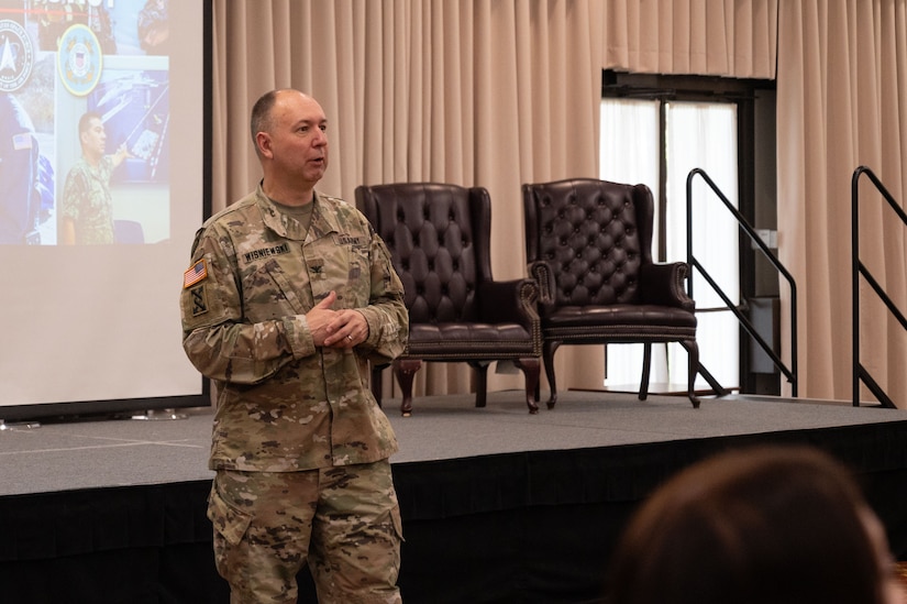 U.S. Army Col. Mitchell Wisniewski, U.S. Army Support Activity Fort Dix commander and Joint Base McGuire-Dix-Lakehurst deputy commander, gives opening remarks at the first ever Joint Base Heritage Conference at JB MDL, May 14, 2024. Historical organizations from neighboring counties came together to establish a professional network and to share historical information pertaining to JB MDL and its surrounding community. (U.S. Air Force photo by Susan Moriarty)