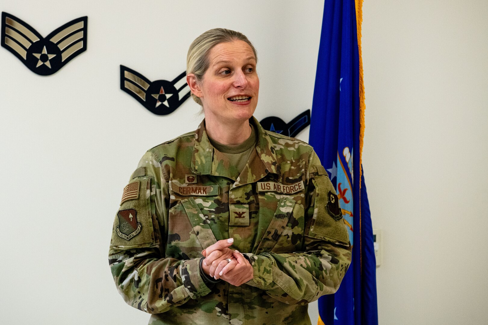 U.S. Air Force Col. Danielle Cermak, 27th Special Operations Medical Group commander, congratulates two of her members that were given coins for their hard work on getting accredited by The Joint Commission at Cannon Air Force Base, New Mexico, May 10, 2024. The 27 SOMDG gained The Gold Seal of Approval ® from the Joint Commission by undergoing a rigorous, unannounced site visit. The Joint Commission is the nation’s leading and most widely recognized healthcare performance improvement organization, and their accreditations and certifications are a nationally recognized distinction. (U.S. Air Force photo by Staff Sgt. Vernon R. Walter III)