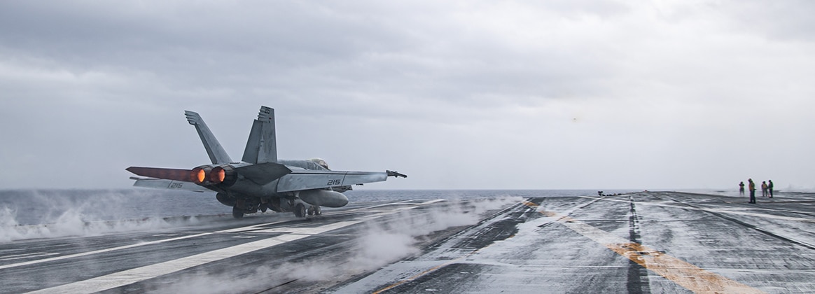An F/A-18E Super Hornet, attached to the Royal Maces of Strike Fighter Squadron (VFA) 27, launches from the flight deck of the USS Ronald Reagan (CVN 76)