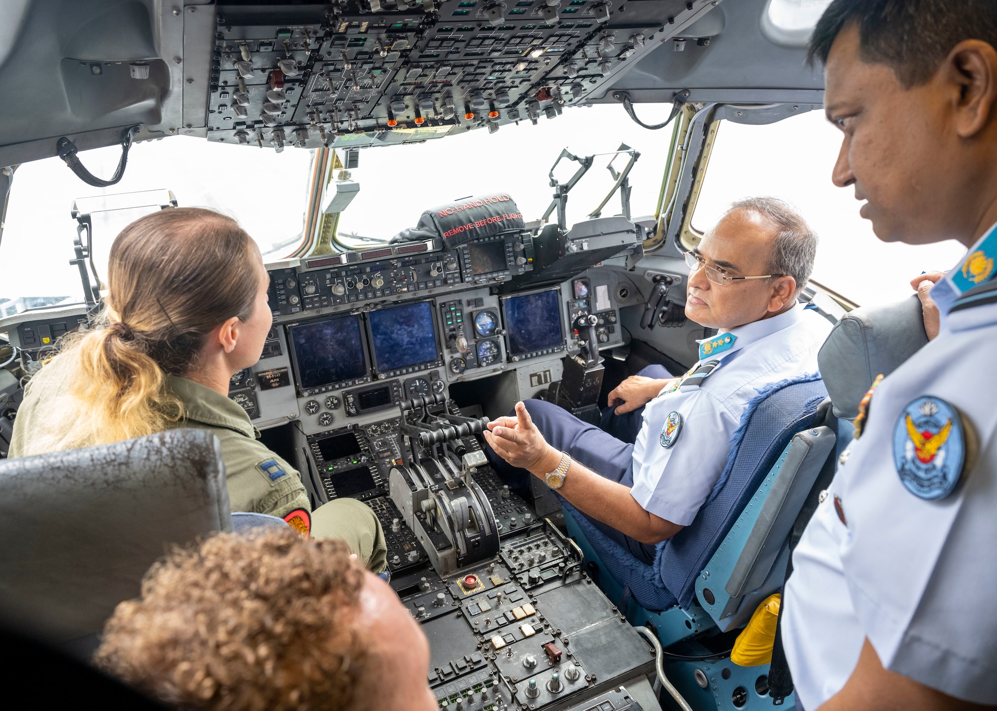 Photo of U.S. Air Force pilot talking with Bangladesh Air Force Air Vice Marshal