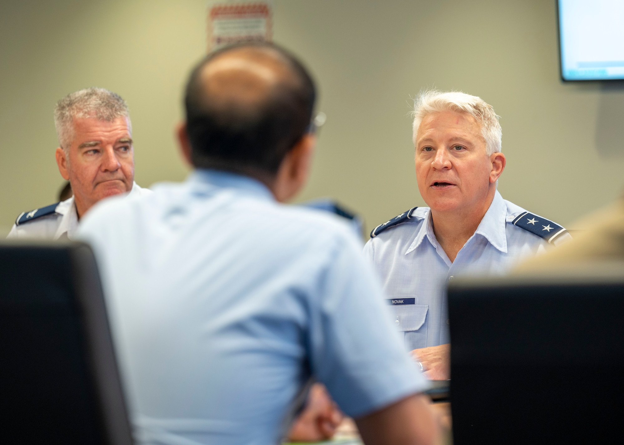 Photo of U.S. Air Force Major General speaking to a Bangladesh Air Force Air Vice Marshal
