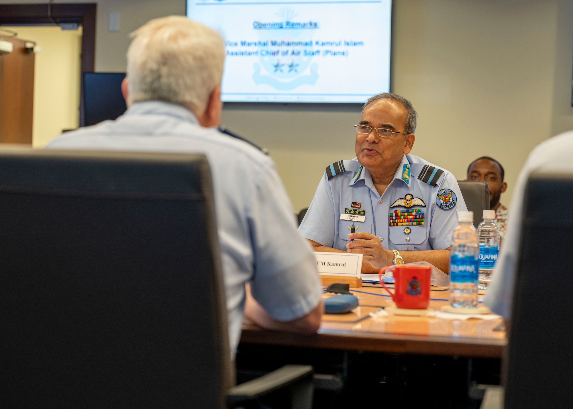 Photo of Bangladesh Air Force Air Vice Marshal speaking to a U.S. Air Force Major General