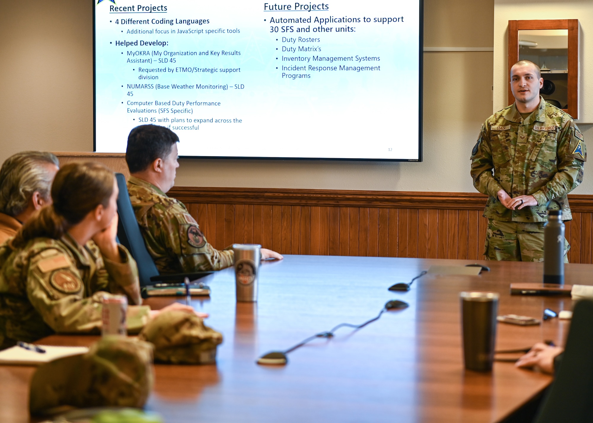 A 30th Security Forces Squadron client systems administrator, shares his experiences in the Supra Coding Program during a Space Launch Delta 30 stand up meeting at Vandenberg Space Force Base.
