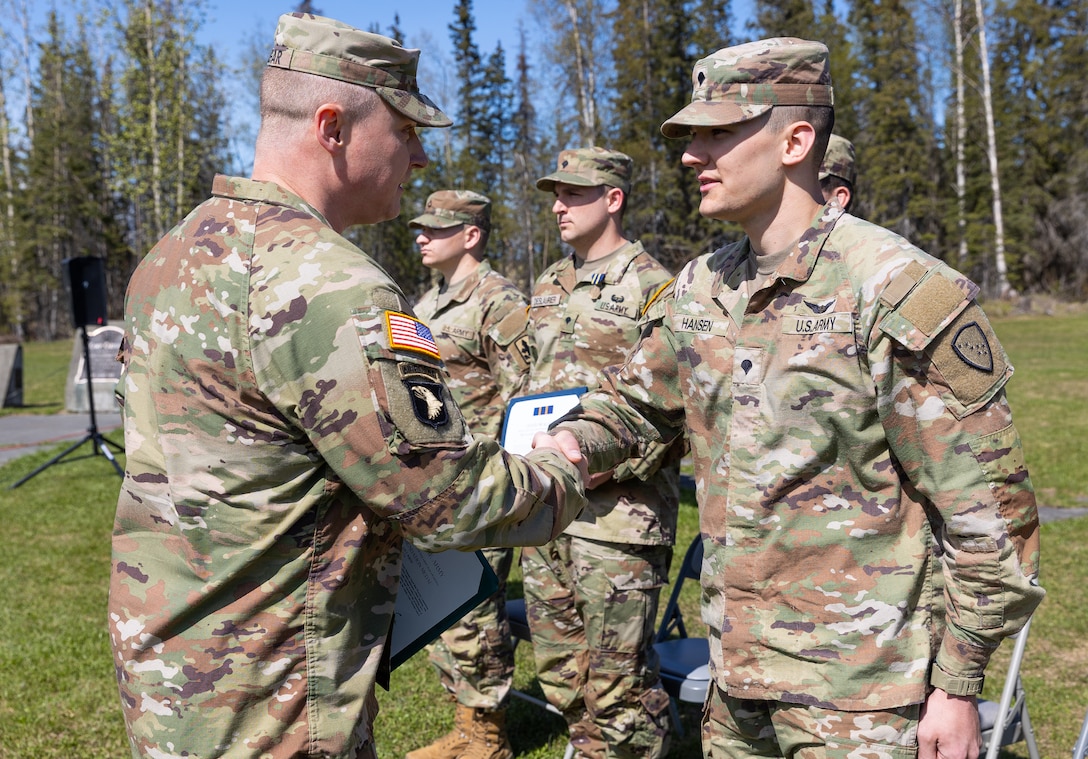 Alaska Army National Guard Spc. Emmanuel Hansen, a CH-47 helicopter repairer assigned to 207th Aviation Troop Command, is awarded 2024 Enlisted Soldier of the Year in a closing ceremony during the AKARNG’s State Best Warrior Competition at Camp Carroll on Joint Base Elmendorf-Richardson, Alaska, May 18, 2024.