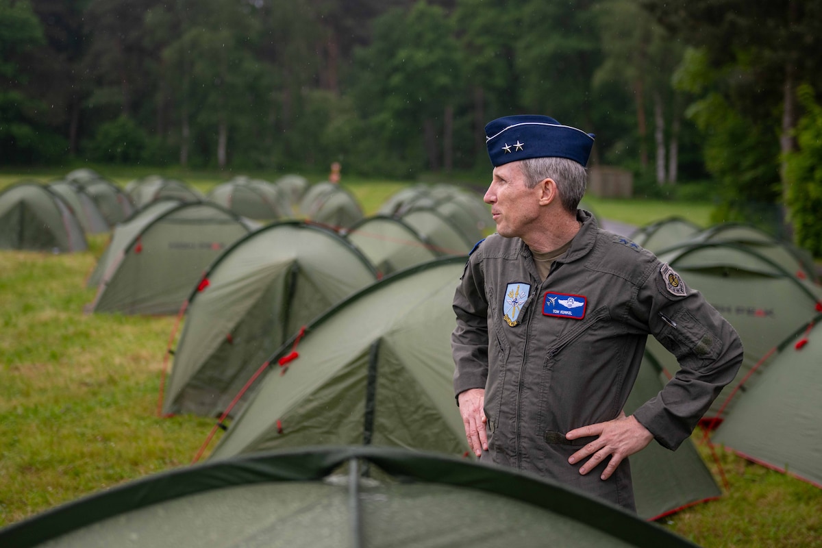 U.S. Air Force Maj. Gen. Thomas Kunkel, NATO Airborne Early Warning and Control commander, visits the living area of 52nd Fighter Wing Airmen during a readiness exercise in support of Astral Knight 24 at Geilenkirchen NATO Air Base, Germany, May 13, 2024. U.S. forces’ ability to respond quickly and assure allies and partners rests upon the fact that they are located in Europe, forward and ready. (U.S. Air Force photo by Airman 1st Class Albert Morel)