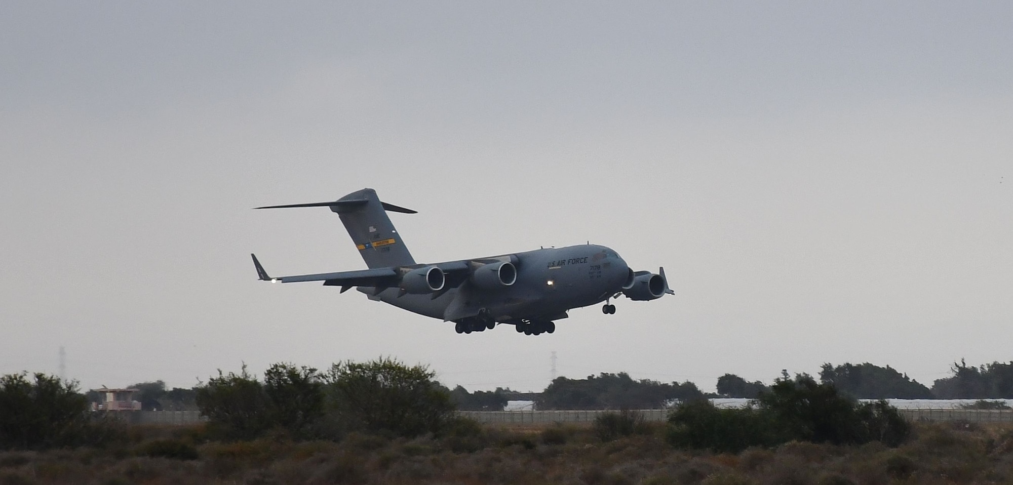 A U.S. Air Force C-17 Globemaster III lands at Agadir-Al Massara International Airport, Agadir, Morocco, May 17, 2024. The C-17 was transporting two AH-64 Apache attack helicopters from 1st Battalion, 211th Aviation Regiment, Utah National Guard, in preparation for African Lion 2024. This year marks the 20th anniversary of U.S. Africa Command’s premier joint exercise led by U.S. Army Southern European Task Force, Africa (SETAF-AF), running from April 19 to May 31 across Ghana, Morocco, Senegal and Tunisia, with over 8,100 participants from 27 nations and NATO contingents. (U.S. Army photo by Maj. Alun Thomas)