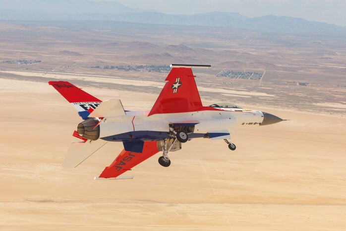 The F-16 Viper Demonstration Team jet flies in the skies over Southern California, May 13. The 412th Maintenance Group, Fabrication Flight - Corrosion Control Team recently repainted the F-16 Viper Demo Team aircraft in the classic YF-16 livery to commemorate the platform's first flight 50 years ago at Edwards Air Force Base, California. (Air Force photo by Christian Turner)