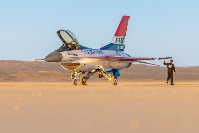 The 412th Maintenance Group, Fabrication Flight - Corrosion Control Team recently repainted the F-16 Viper Demo Team aircraft in the classic YF-16 livery to commemorate the platform's first flight 50 years ago at Edwards Air Force Base, California. (Air Force photo by James West)