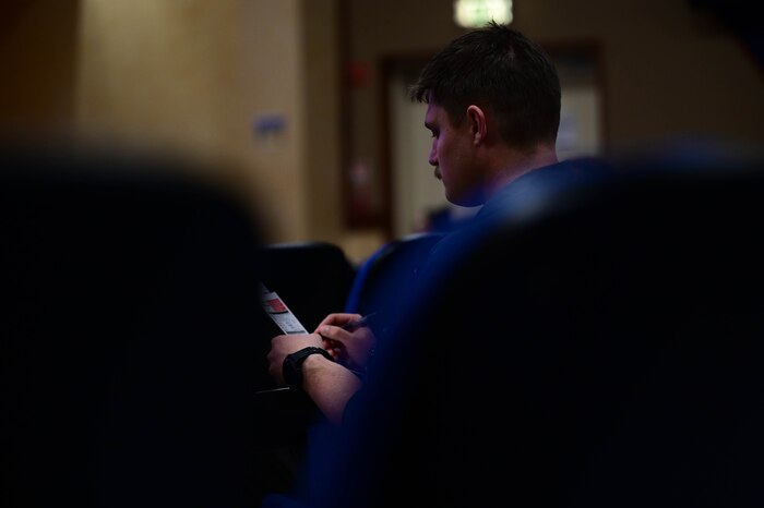 man reads paper