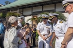 SHIMODA, Japan (May 17, 2024) Cmdr. Ron Jenkins, (middle) the commanding officer of the
Arleigh Burk-class guided-missile destroyer USS Higgins (DDG 76), Lt. Miles Graham, (left) and
Lt. Michael Sparrow (right) answer questions from local children at Gyokusenji Temple in
Shimoda, Japan, May 17. The 85th Black Ship Festival commemorates the 171st anniversary of
the arrival of Commodore Matthew Perry in Japan in 1853, a historical event that marked the
beginning of diplomacy and trade agreements between the U.S. and Japan. Higgins is forward
deployed and assigned to Destroyer Squadron (DESRON) 15, the Navy’s largest DESRON and the
U.S. 7th fleet’s principal surface force. (U.S. Navy photo by Mass Communication Specialist 1st
Class Hannah Fry)