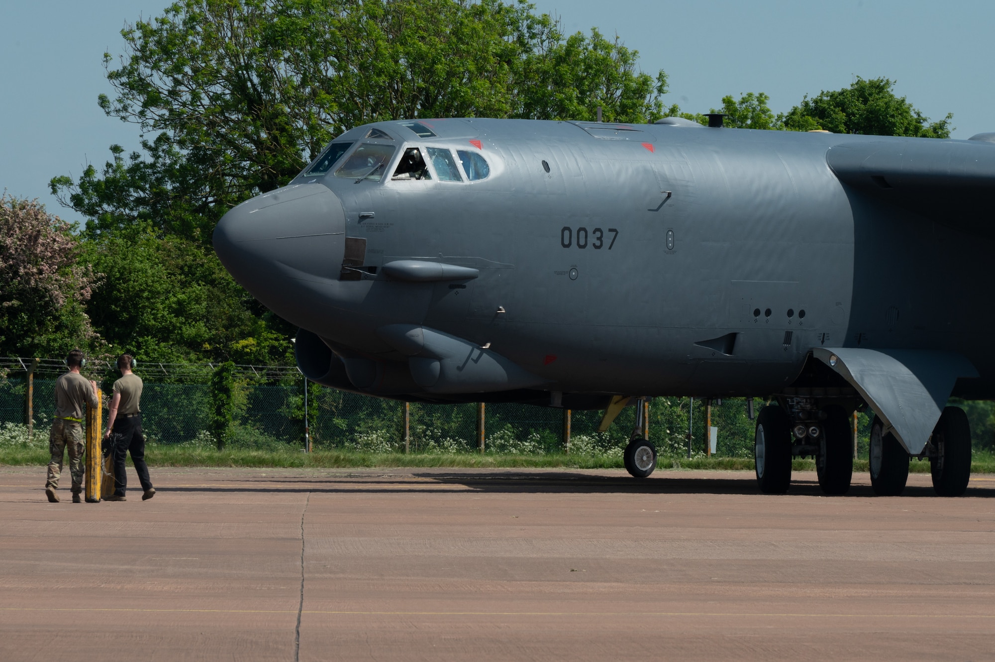 Airmen prepare to unload a B-52 Stratofortress.