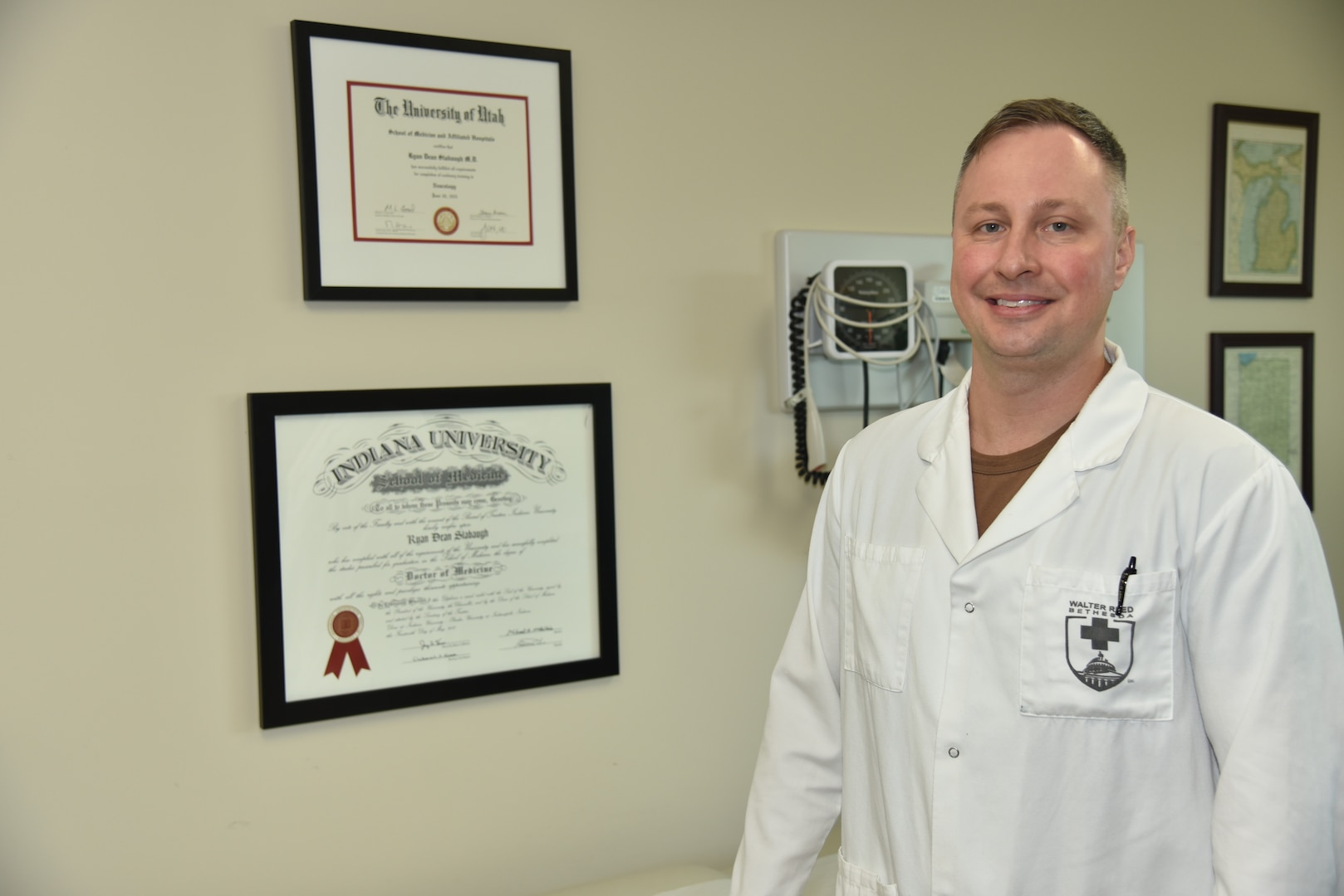 U.S. Navy Lt. Cmdr. (Dr.) Ryan D. Slabaugh poses in his office in the Neurology Department located in the America Building at Walter Reed National Military Medical Center in Bethesda, Maryland, May 1, 2024.