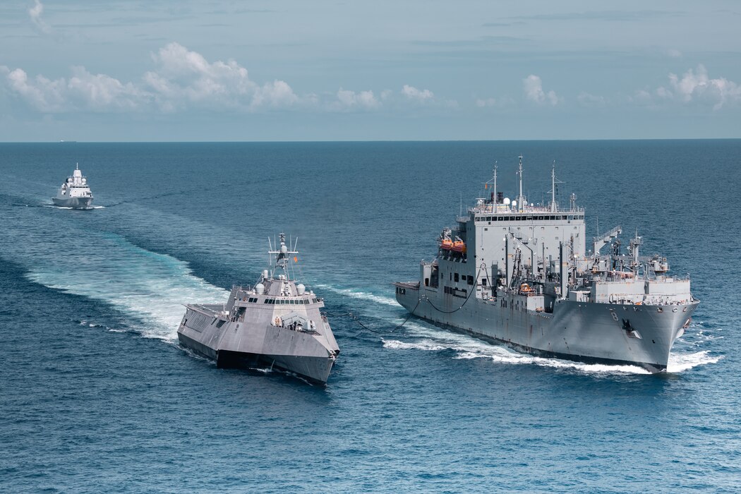 USS Mobile (LCS 26), left, replenishes from USNS Wally Schirra (T-AKE 8).