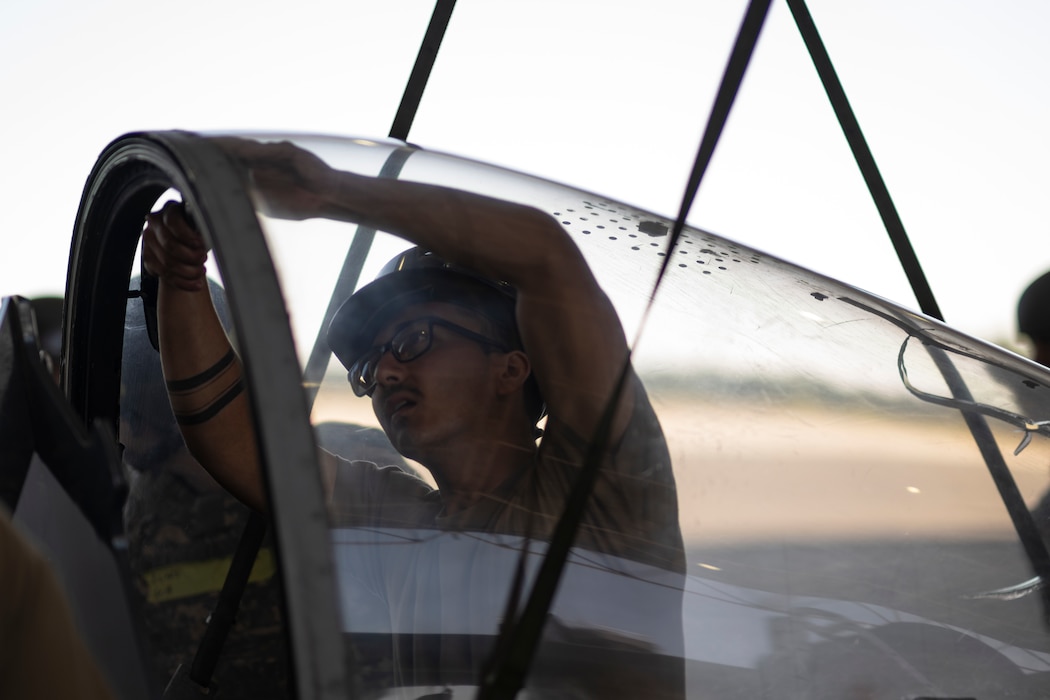 An Airman inside an aircraft canopy