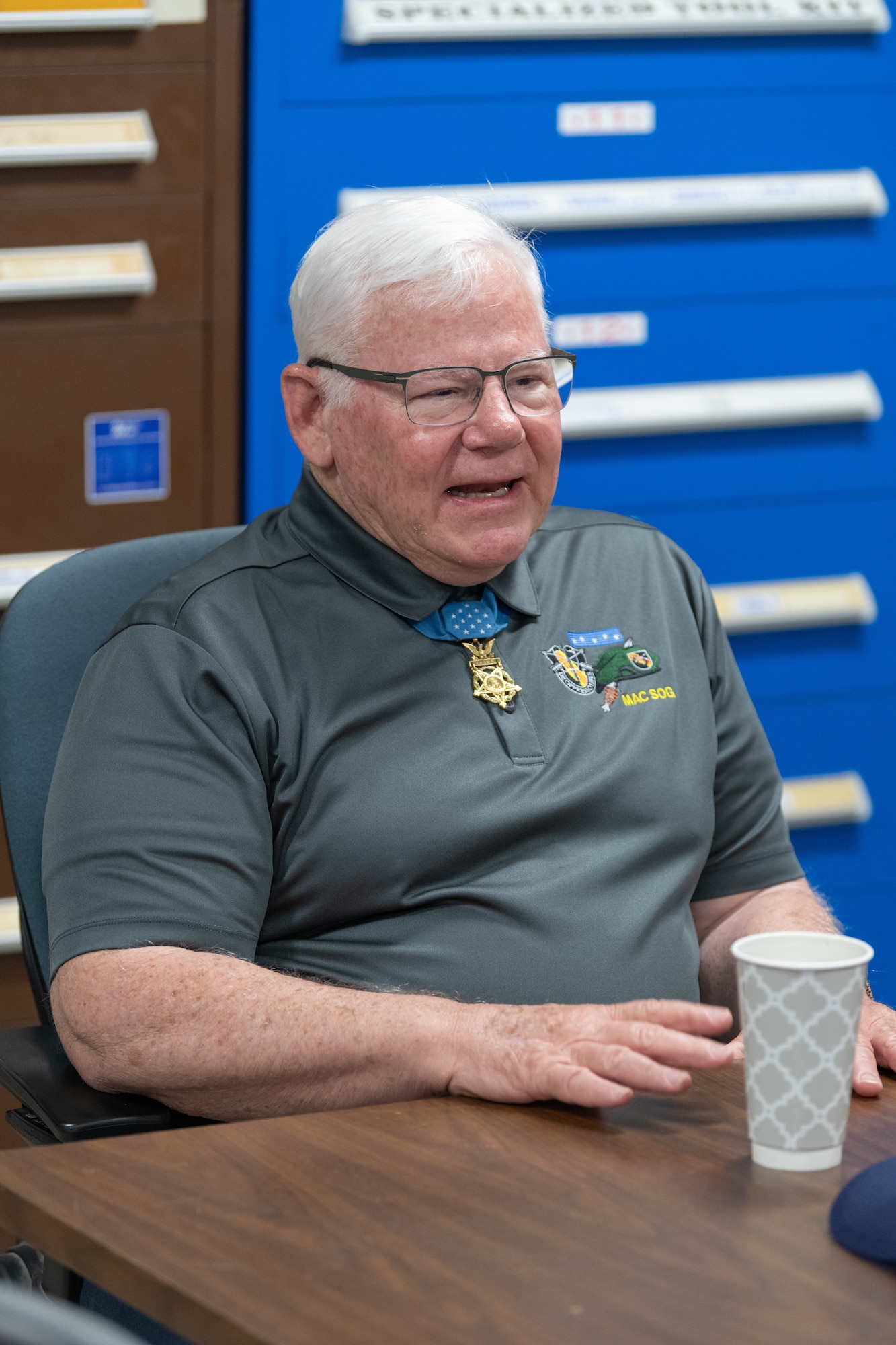 Medal of Honor recipient Gary “Mike” Rose speaks to members of the instrumentation technician and condition-based maintenance craft groups at Arnold Air Force Base, Tenn., during his May 15, 2024, visit to Arnold. Rose recounted his experiences during the Vietnam War and expressed his appreciation to craft crews and others whose work supports warfighters. (U.S. Air Force photo by Keith Thornburgh)