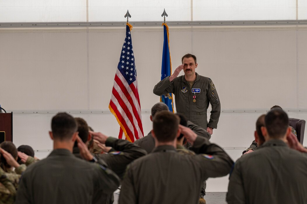 U.S. Air Force Lt. Col Michael Mickus, 355th Fighter Squadron outgoing commander, renders a final salute after relinquishing command at Eielson Air Force Base, Alaska, May 17, 2024.