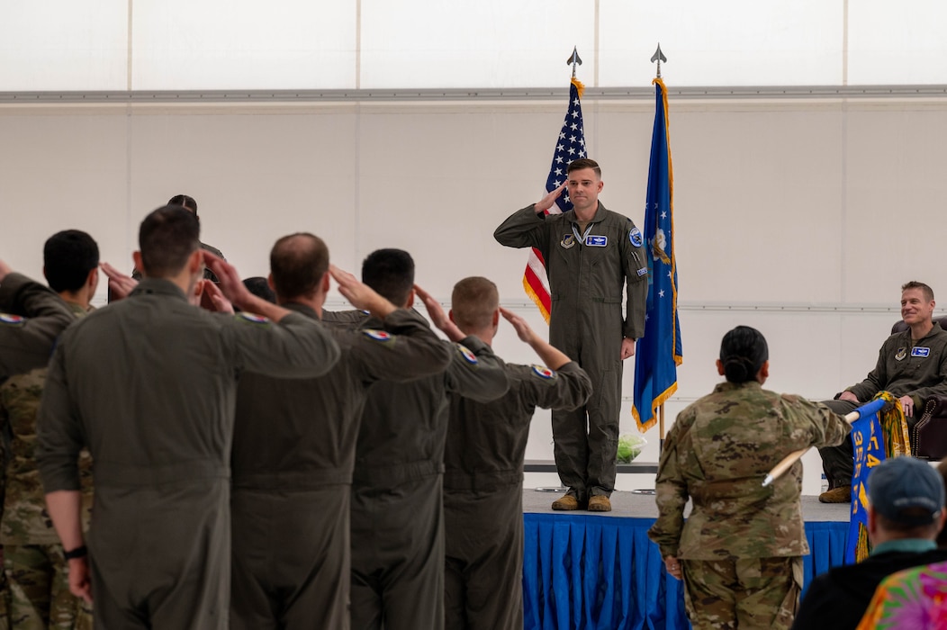 U.S. Air Force Lt. Col. Erik Gonsalves, 355th Fighter Squadron incoming commander, renders an initial salute after assuming command at Eielson Air Force Base, Alaska, May 17, 2024.