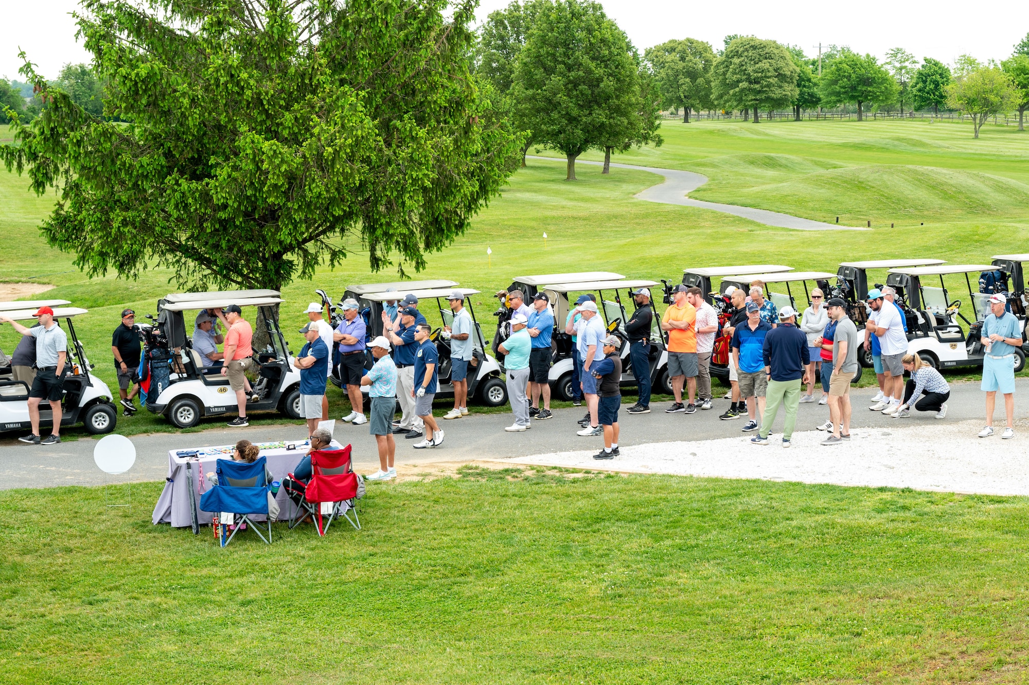 Team Dover gathers for the Bluesuiters Golf Tournament at Jonathan’s Landing Golf Course in Magnolia, Delaware, May 9, 2024. Bluesuiters is a biannual golf tournament connecting Team Dover Airmen with local civic and business leaders from the community. (U.S. Air Force photo by Airman Liberty Matthews)