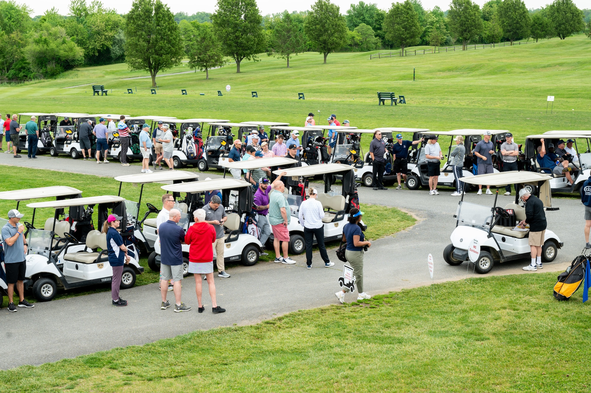 Team Dover gathers for the Bluesuiters Golf Tournament at Jonathan’s Landing Golf Course in Magnolia, Delaware, May 9, 2024. Bluesuiters is a biannual golf tournament connecting Team Dover Airmen with local civic and business leaders from the community. (U.S. Air Force photo by Airman Liberty Matthews)