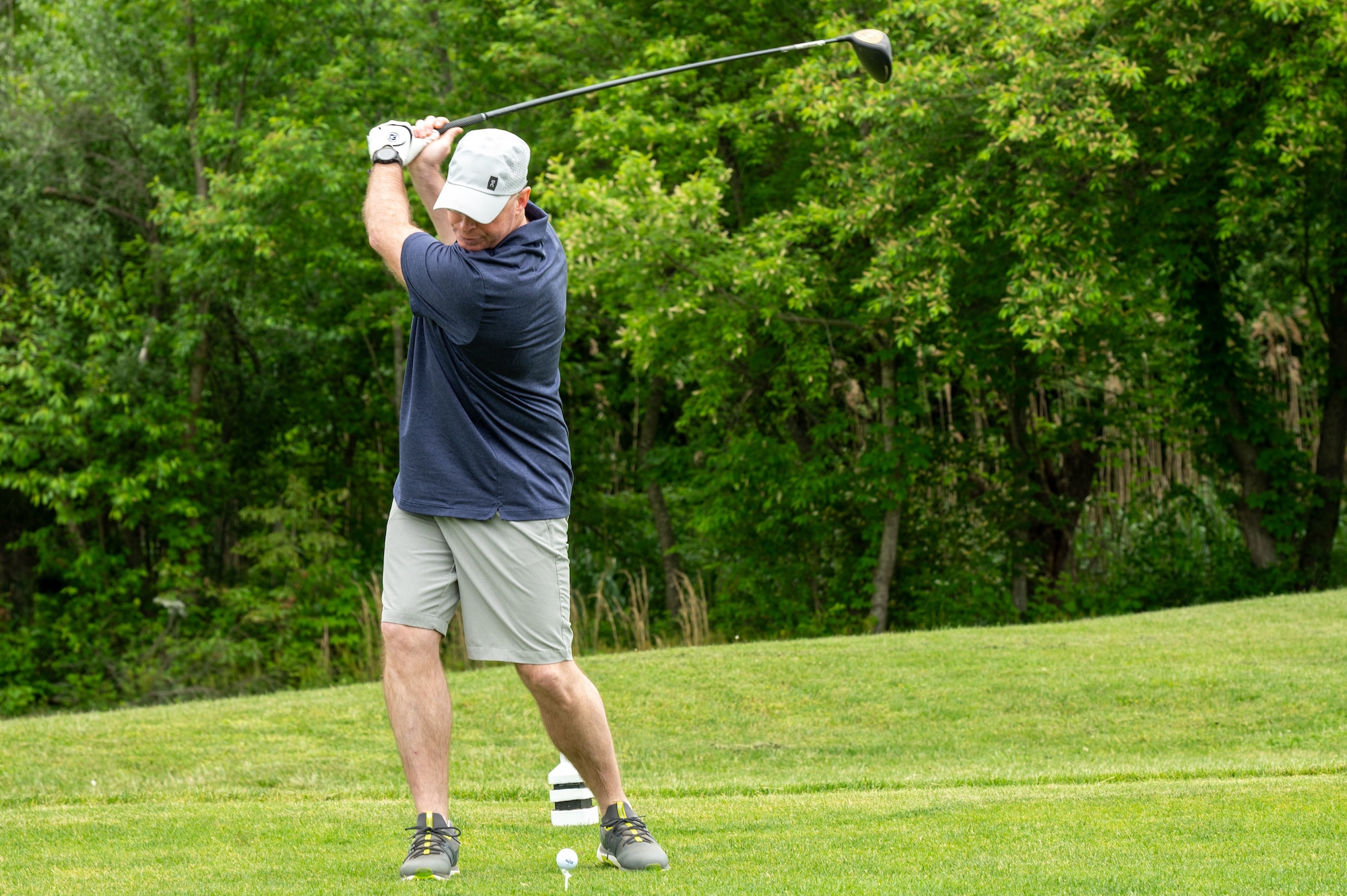 U.S. Air Force Col. Chris McDonald, 436th Airlift Wing Commander, tees off for the Bluesuiters Golf Tournament at Jonathan’s Landing Golf Course in Magnolia, Delaware, May 9, 2024. Bluesuiters is a biannual golf tournament connecting Team Dover Airmen with local civic and business leaders from the community. (U.S. Air Force photo by Airman Liberty Matthews)