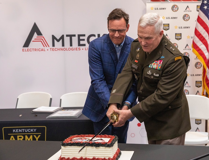 The Kentucky Army National Guard hosted the signing of a partnership agreement between Amteck and the U.S. Army Partnership for Success (PaYS) program at Amteck headquarters, May 20, 2024. Maj. General Haldane Lamberton and Daren Turner, Amteck CEO cut the cake signaling the official partnership. (U.S. Army National Guard phot by Sgt. Destini Keene)