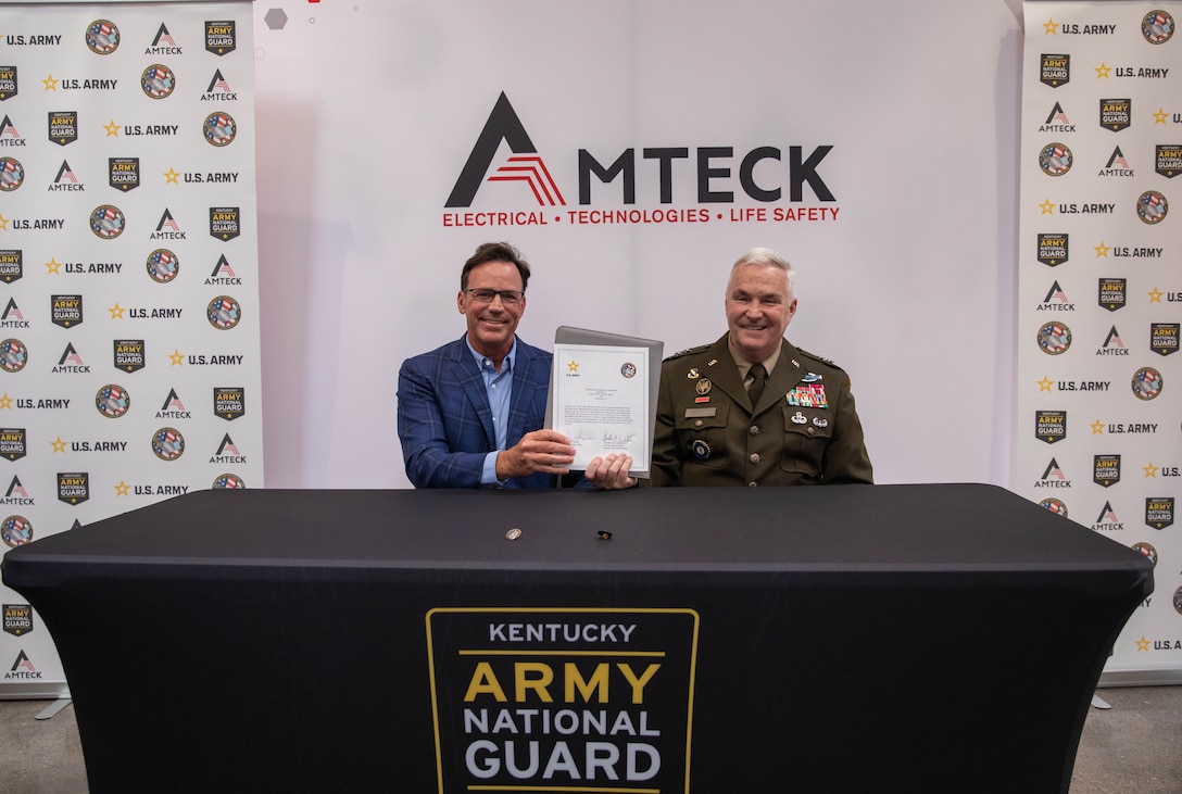 The Kentucky Army National Guard hosted the signing of a partnership agreement between Amteck and the U.S. Army Partnership for Success (PaYS) program at Amteck headquarters, May 20, 2024. Maj. General Haldane Lamberton and Daren Turner, Amteck CEO signed the memorandum of agreement. (U.S. Army National Guard photo by Sgt. Destini Keene)