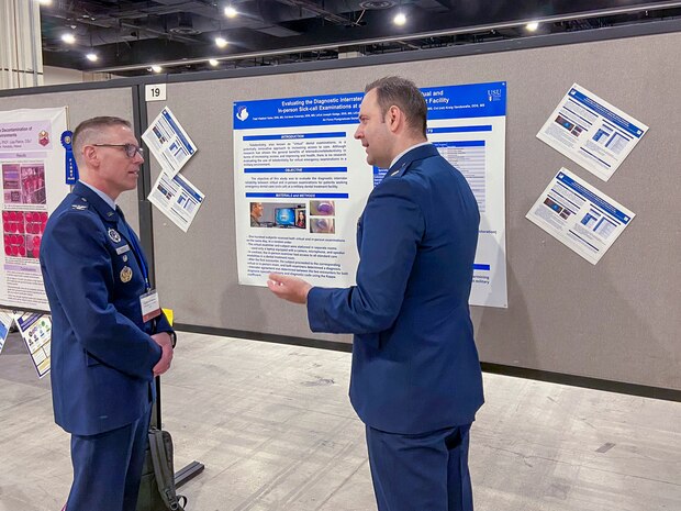 U.S. Air Force Maj. Vladimir Vader, 9th Medical Group dental flight comprehensive dentist, presents his dental research at the Defense Health Agency Research and Engineering Directorate, Clinical Investigations Program Branch poster presentation contest for early career health professionals during the meeting of The Society of Federal Health Professionals (AMSUS), Feb. 12-15, 2024, in National Harbor, Maryland.