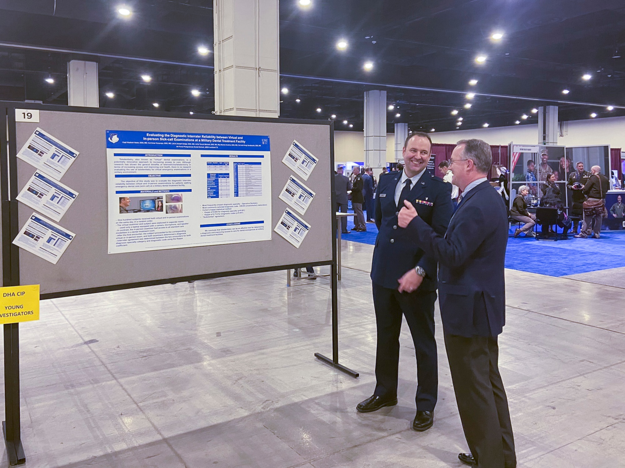 U.S. Air Force Maj. Vladimir Vader, 9th Medical Group dental flight comprehensive dentist, presents his research at the Defense Health Agency Research and Engineering Directorate, Clinical Investigations Program Branch poster presentation contest for early career health professionals during the meeting of The Society of Federal Health Professionals (AMSUS), Feb. 12-15, 2024, in National Harbor, Maryland.