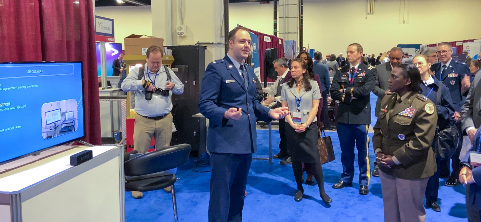 U.S. Air Force Maj. Vladimir Vader, 9th Medical Group dental flight comprehensive dentist, gives an oral presentation of his dental study at the Defense Health Agency Research and Engineering Directorate, Clinical Investigations Program Branch contest for early career health professionals during the meeting of The Society of Federal Health Professionals (AMSUS), Feb. 12-15, 2024, in National Harbor, Maryland.
