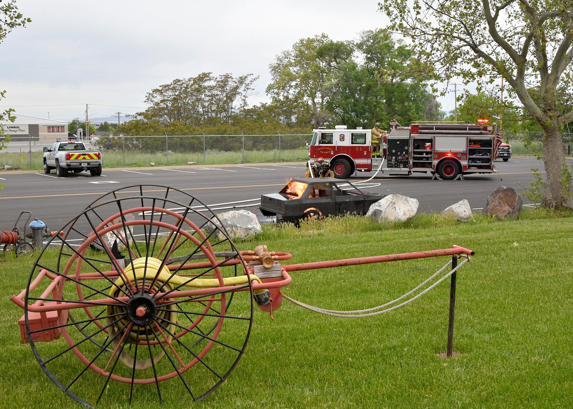 a simulated car fire begins