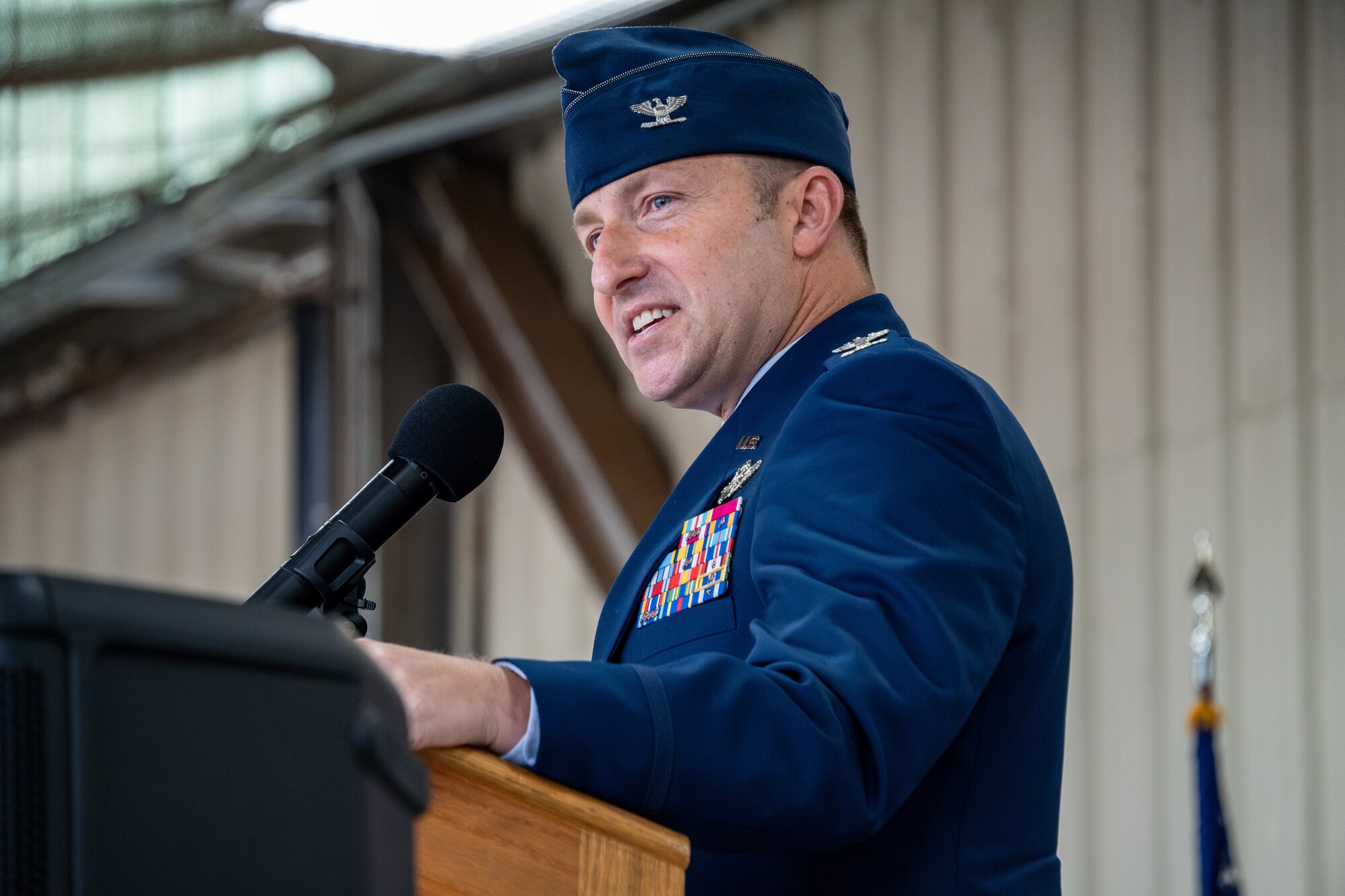 An Air Force Col talks at a podium