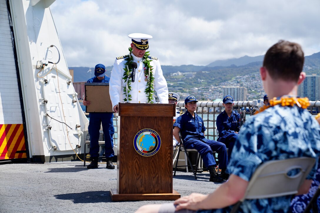 U.S. Coast Guard Capt. Robert Mohr delivers remarks during the Coast Guard Cutter Waesche’s (WMSL 751) change of command ceremony aboard the cutter while moored at Base Honolulu, May 20, 2024. Capt. Tyson Scofield relieved Mohr as Waesche’s commanding officer during the ceremony. (U.S. Coast Guard photo by Petty Officer 3rd Class Jennifer Nilson)