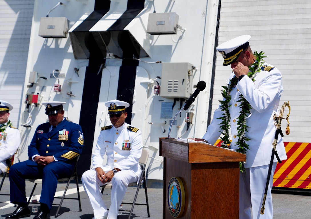 U.S. Coast Guard Capt. Robert Mohr delivers remarks during the Coast Guard Cutter Waesche’s (WMSL 751) change of command ceremony aboard the cutter while moored at Base Honolulu, May 20, 2024. Capt. Tyson Scofield relieved Mohr as Waesche’s commanding officer during the ceremony. (U.S. Coast Guard photo by Petty Officer 3rd Class Jennifer Nilson)