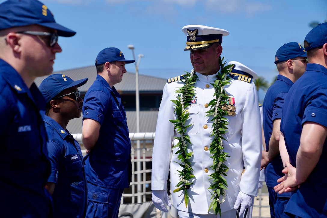 U.S. Coast Guard Capt. Robert Mohr, Coast Guard Cutter Waesche’s (WMSL 751) commanding officer, conducts a crew inspection during the Waesche’s change of command ceremony aboard the cutter while moored at Base Honolulu, May 20, 2024. Capt. Tyson Scofield relieved Mohr as Waesche’s commanding officer during the ceremony. (U.S. Coast Guard photo by Petty Officer 3rd Class Jennifer Nilson)