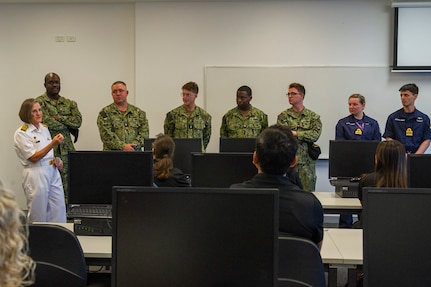 FREMANTLE, Western Australia (March 13, 2024) – U.S. Navy sailors assigned to the Los Angeles-class fast-attack submarine USS Annapolis (SSN 760) and Royal Navy sailors speak with students of South Metropolitan TAFE, Fremantle Campus, in Fremantle, Western Australia, March 13, 2024. The nuclear-powered, conventionally-armed submarine is in HMAS Stirling for the second visit by a fast-attack submarine to Australia since the announcement of the AUKUS (Australia, United Kingdom, United States) Optimal Pathway in March 2023. (U.S. Navy photo by Mass Communication Specialist 2nd Class Kaitlyn E. Eads)