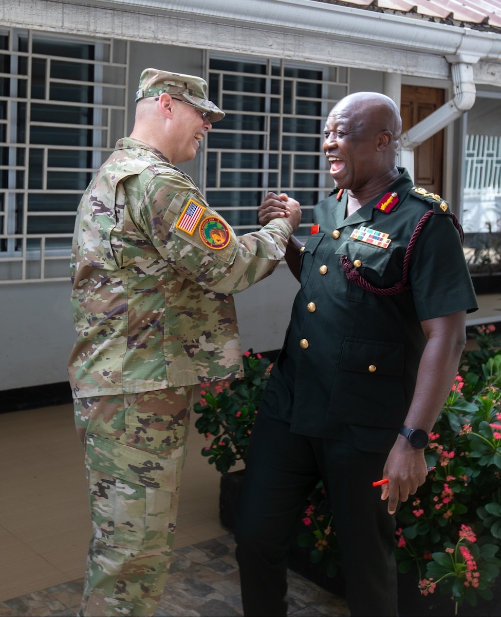 U.S. Army Brig. Gen. John LeBlanc, deputy commanding general (National Guard) of U.S. Army Southern European Task Force, Africa greets Maj. Gen. Raymond Ewusi, deputy chief of staff in charge of medical services, Ghana Armed Forces, before the opening ceremony of a medical readiness exercise in Accra, Ghana, May 13, 2024.